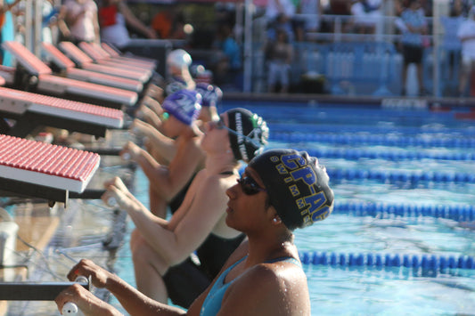 Texas Swim Teams (How Heat, Training Volume, and Competition Shape Swimwear Needs)