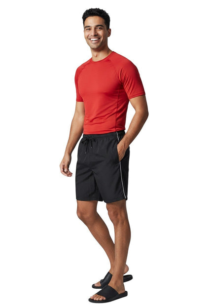 RISE Solid Male Flex Board Short in black, shown on model