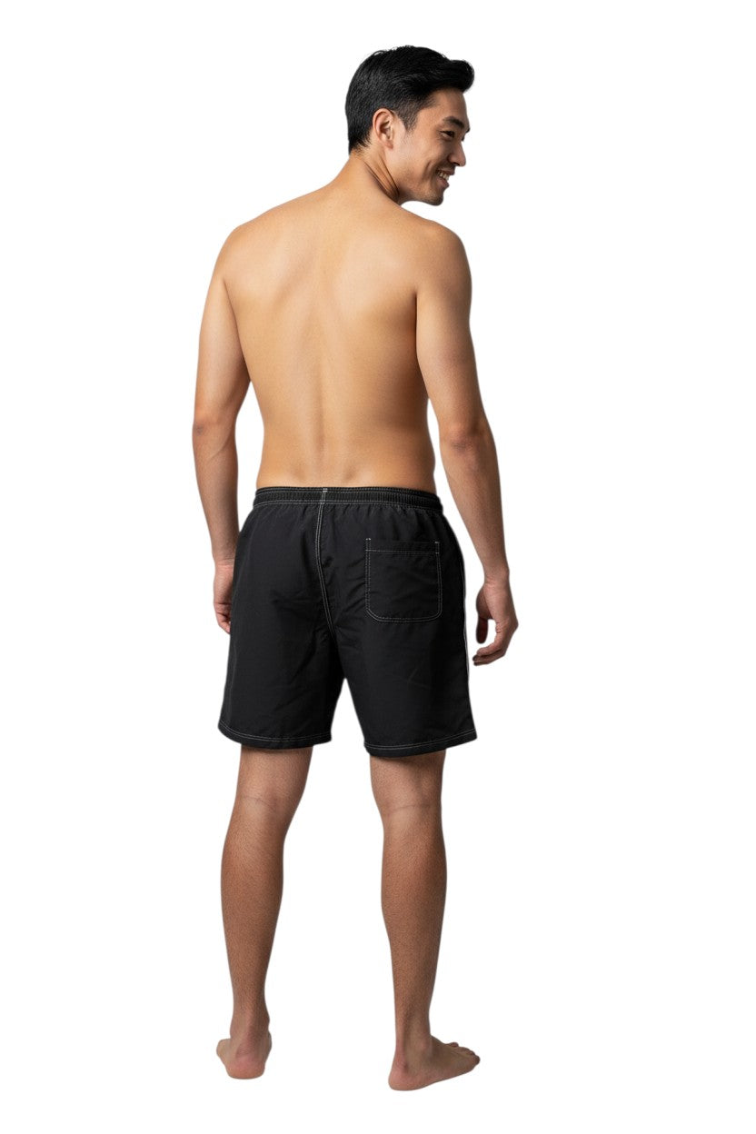 Black polyester-spandex blend boardshorts with white drawstring, contrast stitching, and GUARD logo.