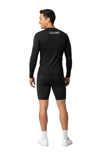 RISE Guard Long Sleeve Crew Neck Rashguard in black, shown on model
