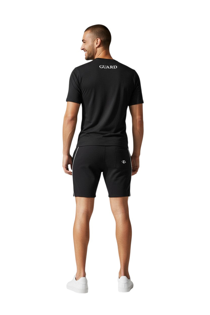 RISE Guard Short Sleeve Crew Neck Rashguard in black, shown on model