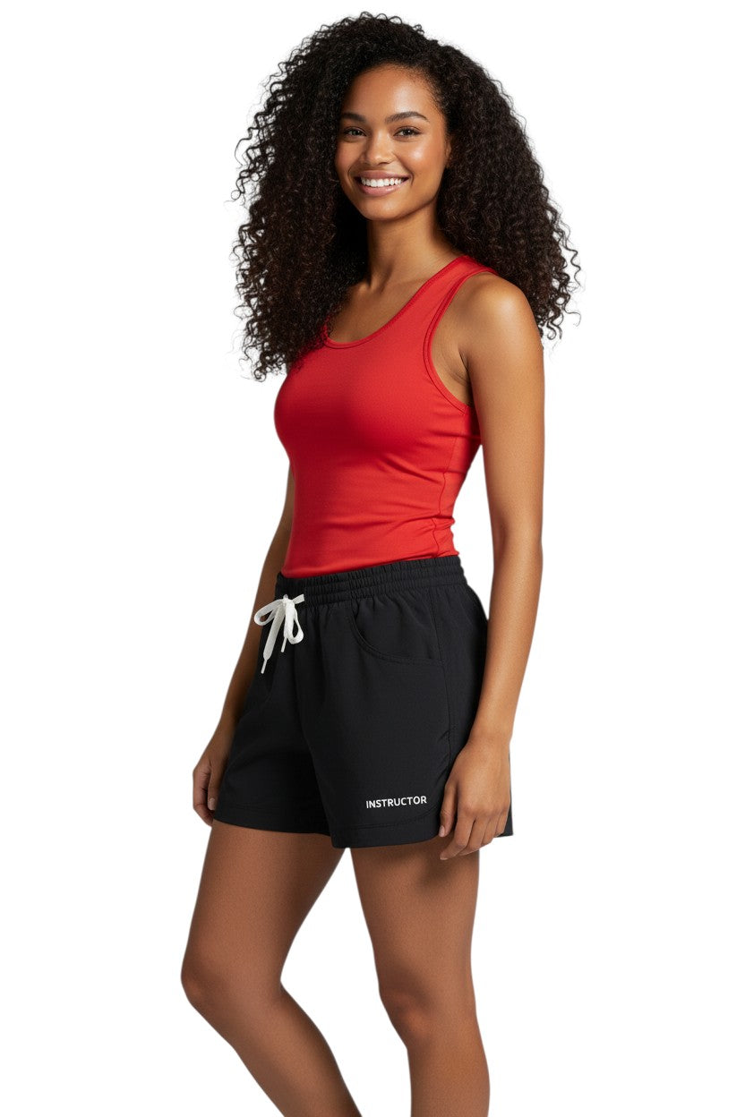 RISE Instructor Female Roll Short in black, shown on model