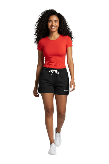 RISE Instructor Female Roll Short in black, shown on model