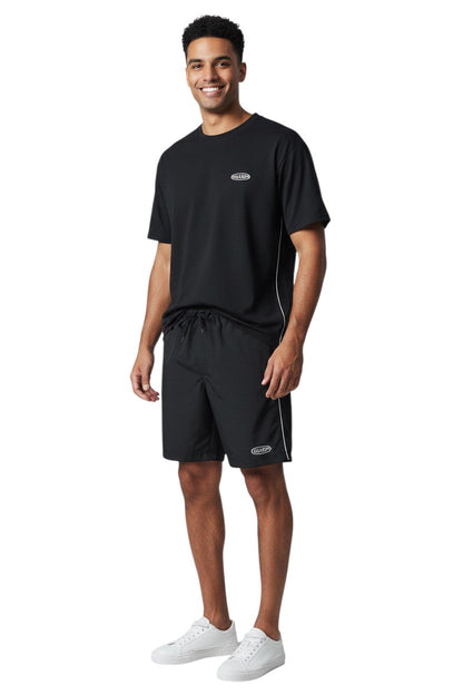 RISE Guard Male Flex Board Short in black, shown on model