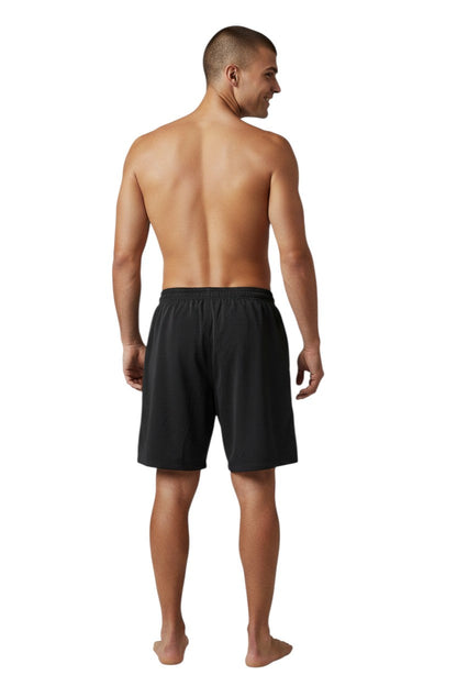 RISE Manager Male Flex Board Short in black, shown on model