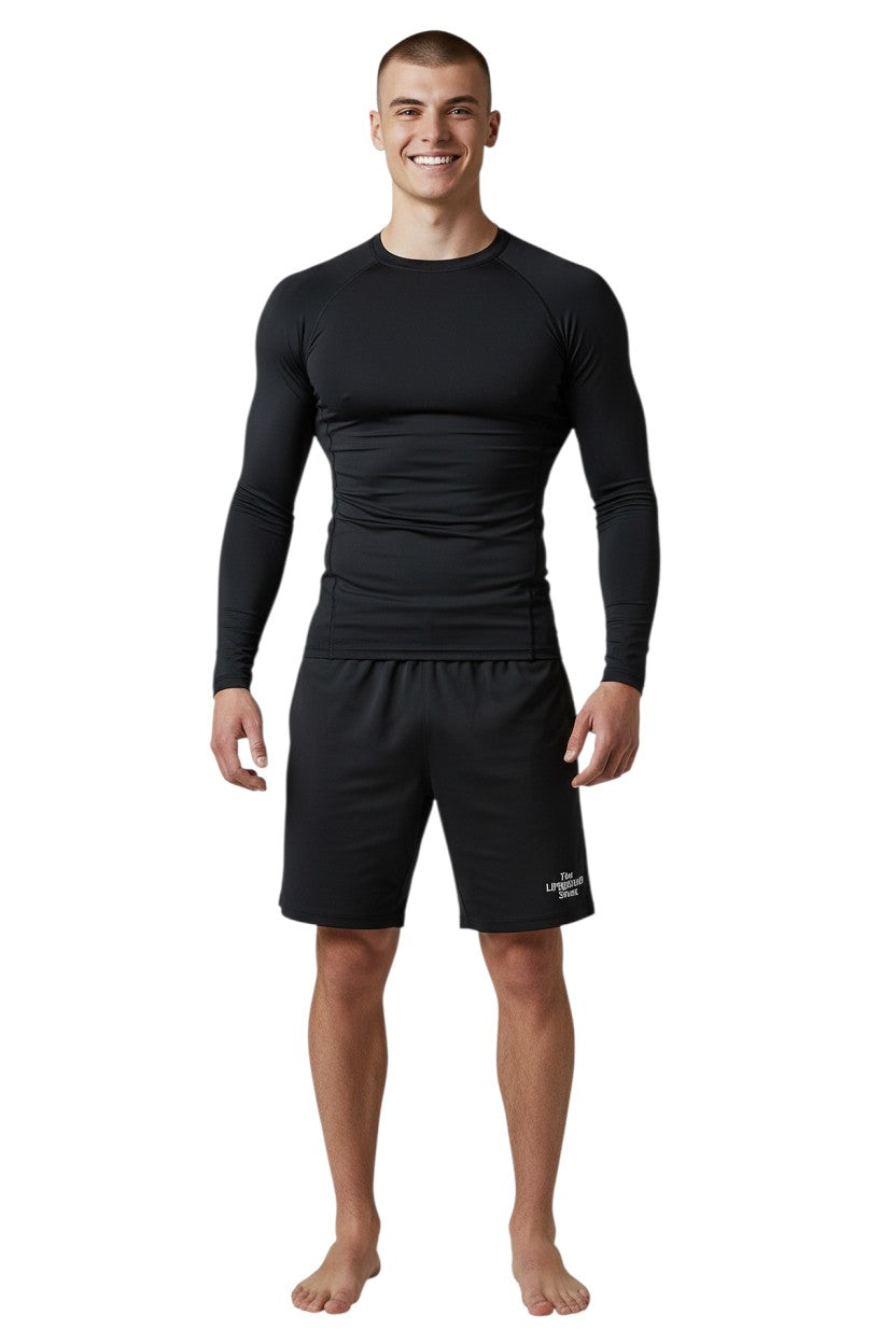 Kiefer Solid Long Sleeve Crewneck Rashguard in black, shown on model