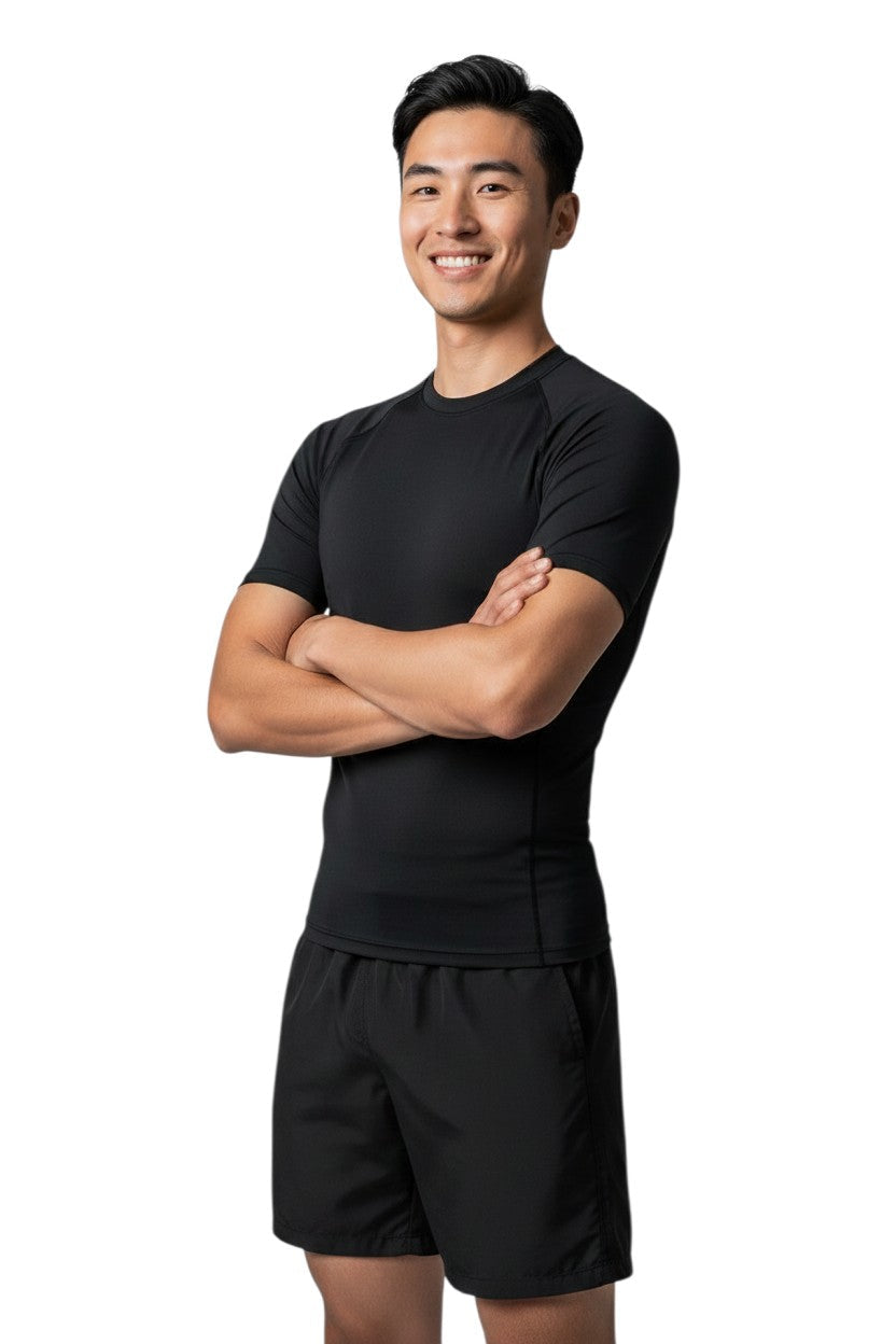 Kiefer Solid Short Sleeve Crewneck Rashguard in black, shown on model