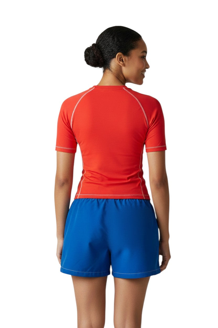 RISE Solid Flex Waterpark Board Short in blue, shown on model