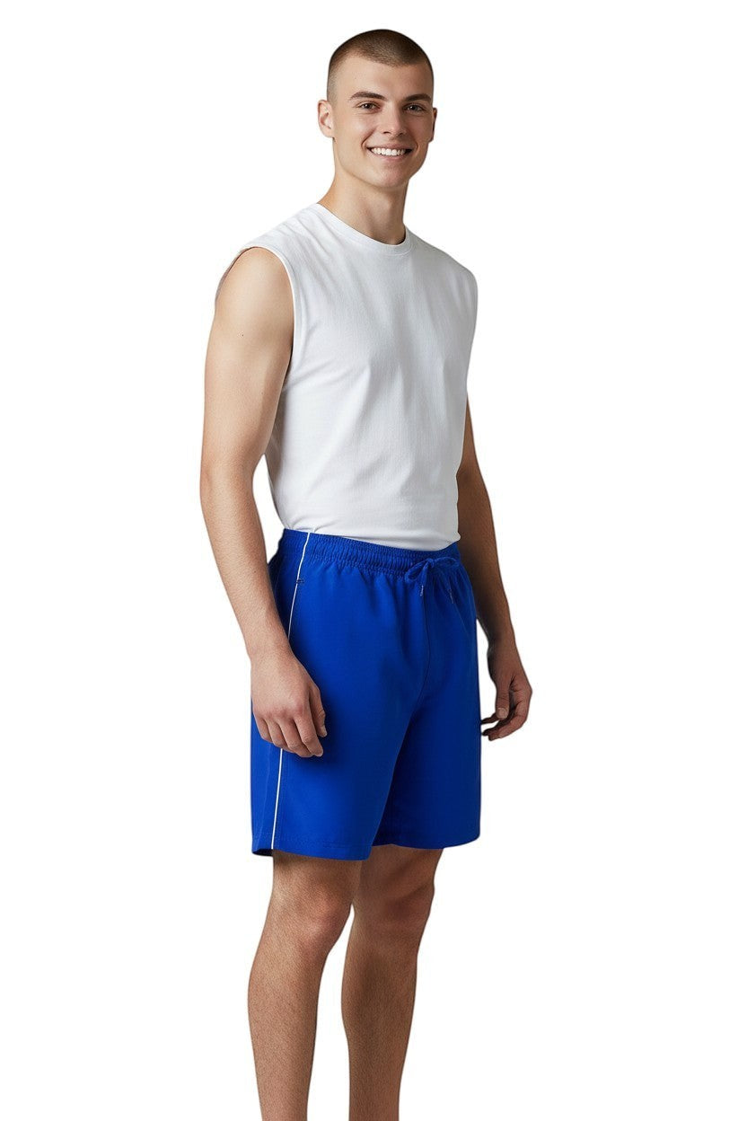 RISE Solid Male Flex Board Short in blue, shown on model