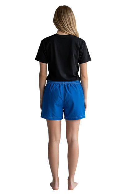 RISE Guard Flex Waterpark Board Short in blue, shown on model