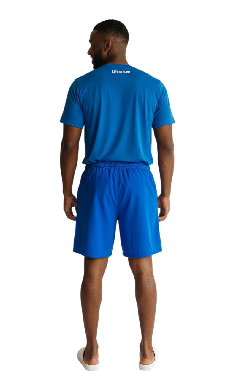 RISE Guard Male Flex Board Short in blue, shown on model