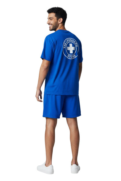 RISE Staff Male Flex Board Short in blue, shown on model