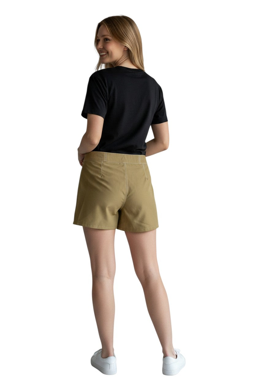 RISE Solid Female Flex Short in khaki polyester-spandex with white contrast stitching and 5" inseam.