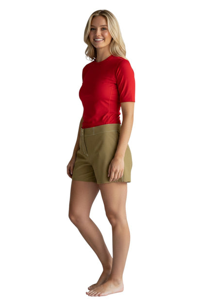 RISE Solid Female Flex Short in khaki, polyester-spandex blend with white contrast stitching and 5" inseam.