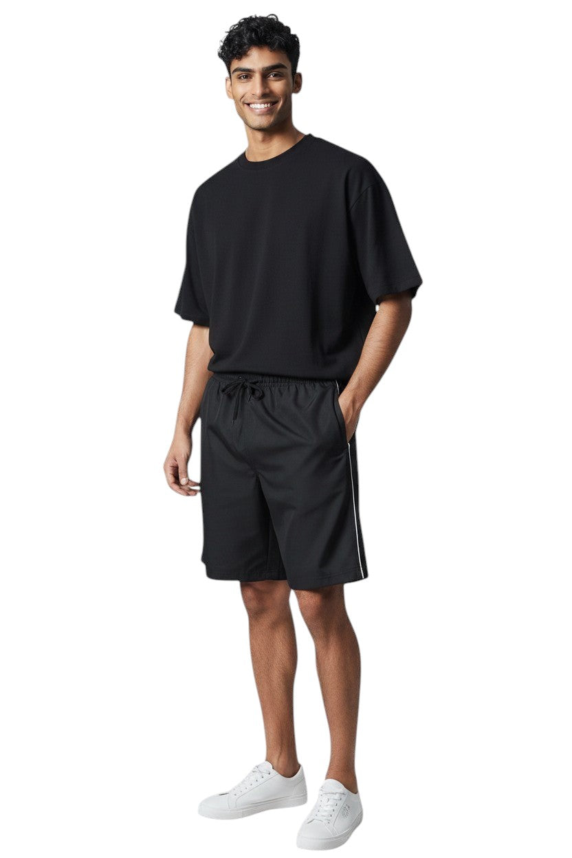 Kiefer Solid Board Short in black, shown on model
