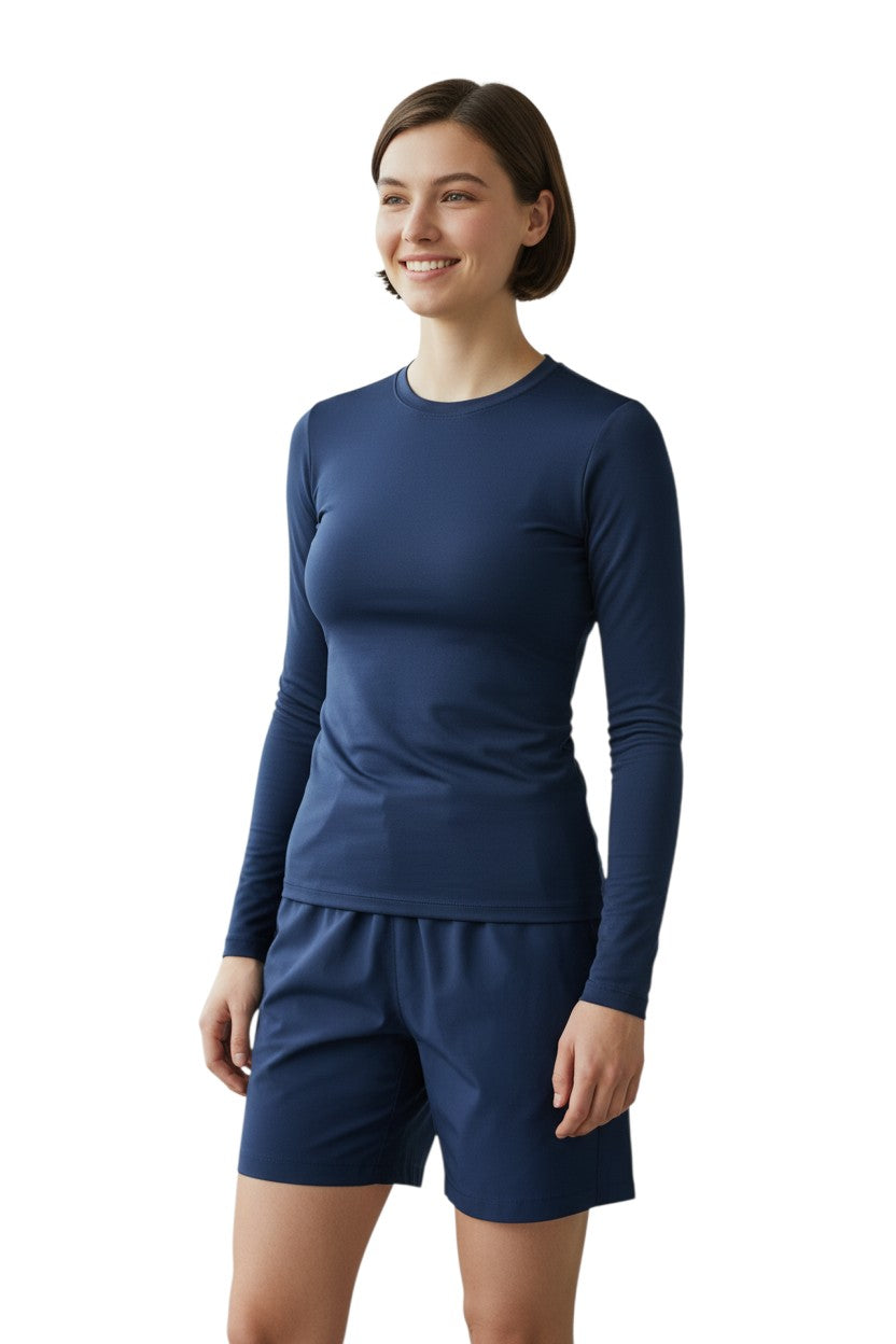 Kiefer Solid Long Sleeve Crewneck Rashguard in navy, shown on model