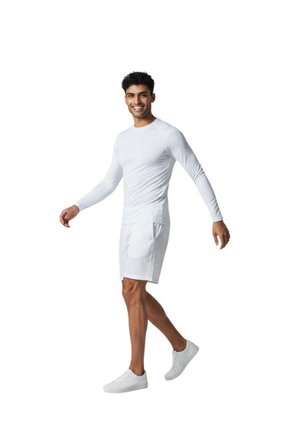 Kiefer Solid Long Sleeve Crewneck Rashguard in white, shown on model