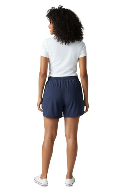 Kiefer Women's Guard 5 inch Short in navy, shown on model