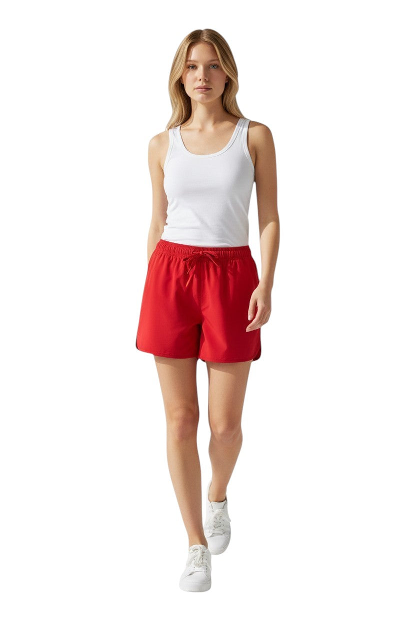 Kiefer Women's 5 inch Short in red, shown on model