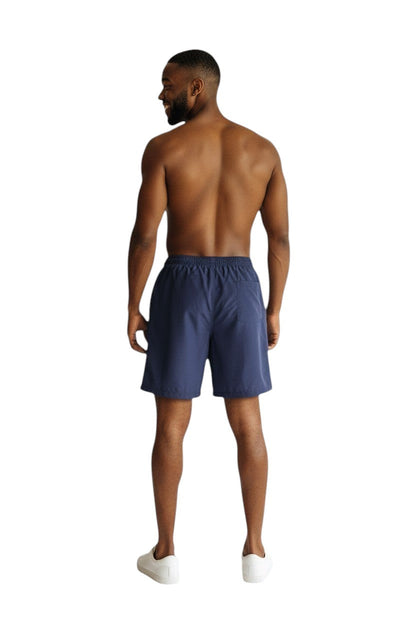 Kiefer Solid Board Short in navy, shown on model