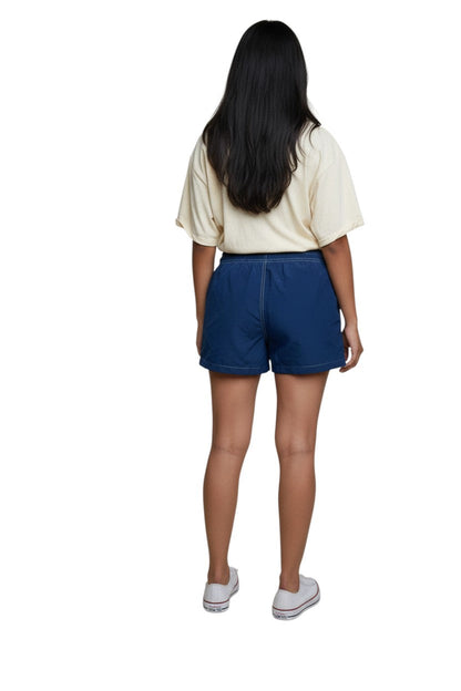 RISE Guard Flex Waterpark Board Short in navy, shown on model