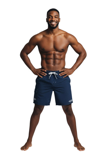 Navy blue polyester-spandex boardshorts with white drawstring, contrast stitching, and GUARD logo.