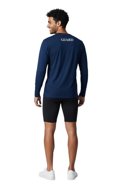 RISE Guard Long Sleeve Crew Neck Rashguard in navy, shown on model