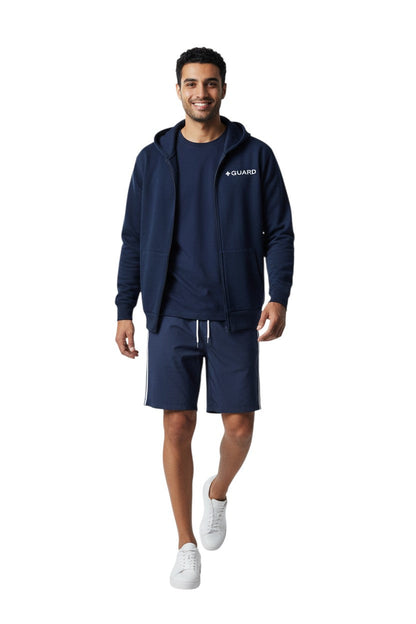 Navy blue cotton-polyester blend zip-up hoodie with GUARD logo on chest. Features a double-lined hood and front pockets.