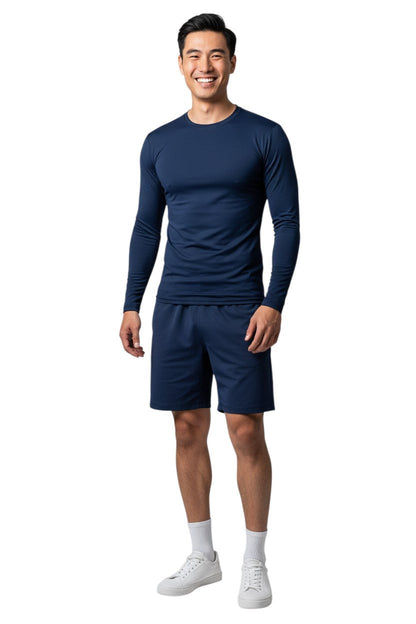 Kiefer Solid Long Sleeve Crewneck Rashguard in navy, shown on model