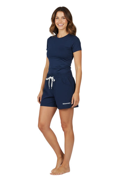 RISE Manager Female Roll Short in navy, shown on model