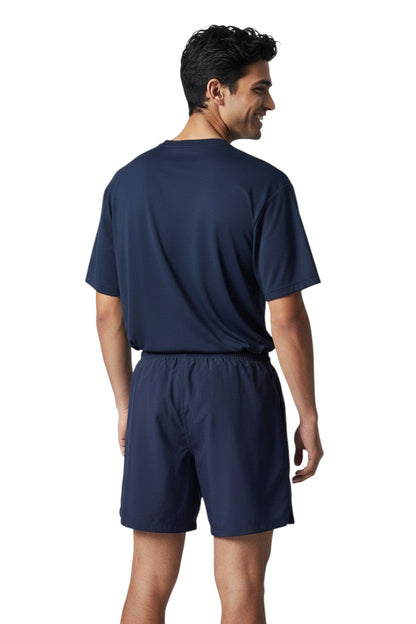 RISE Instructor Male Flex Board Short in navy, shown on model
