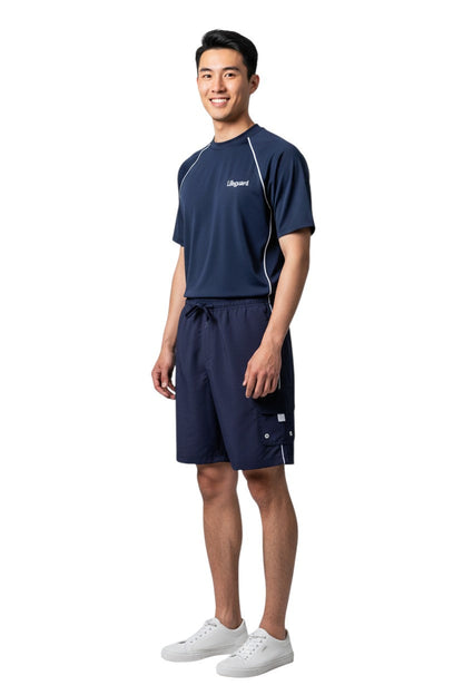 RISE Guard Male Flex Board Short in navy, shown on model