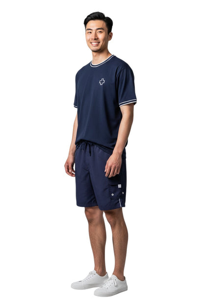 RISE Staff Male Flex Board Short in navy, shown on model