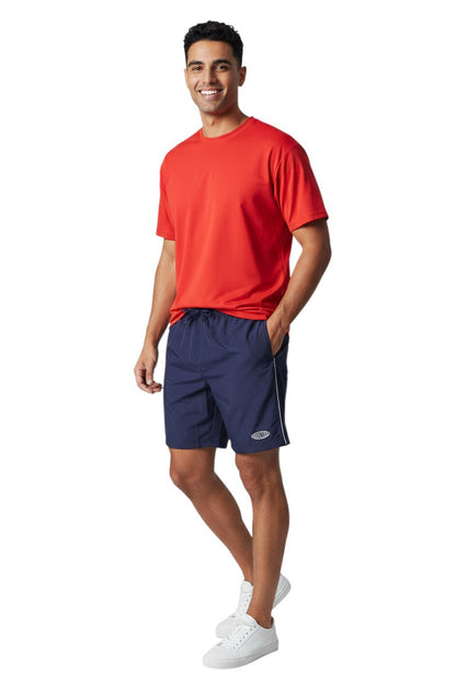 RISE Instructor Male Flex Board Short in navy, shown on model