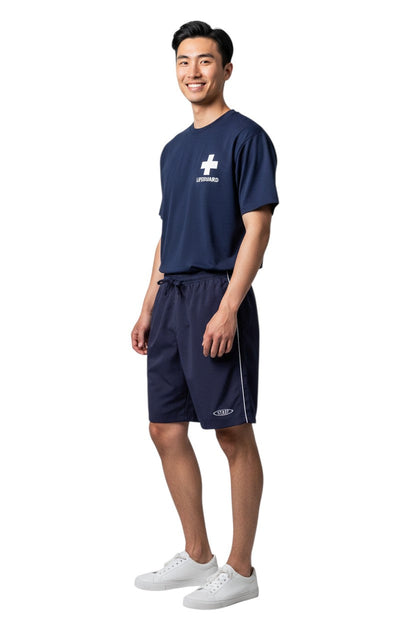 RISE Staff Male Flex Board Short in navy, shown on model
