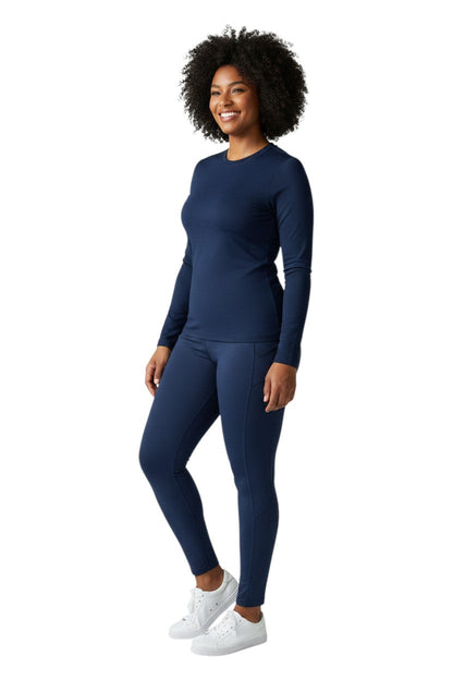 RISE Solid Long Sleeve Crew Neck Rashguard in navy, shown on model
