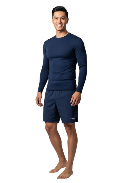 Kiefer Solid Long Sleeve Crewneck Rashguard in navy, shown on model