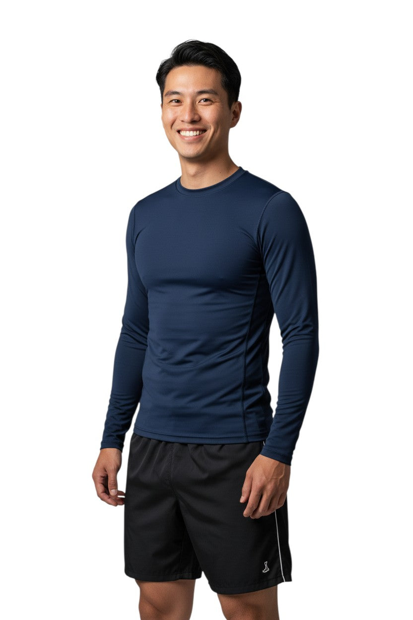RISE Solid Long Sleeve Crew Neck Rashguard in navy, shown on model