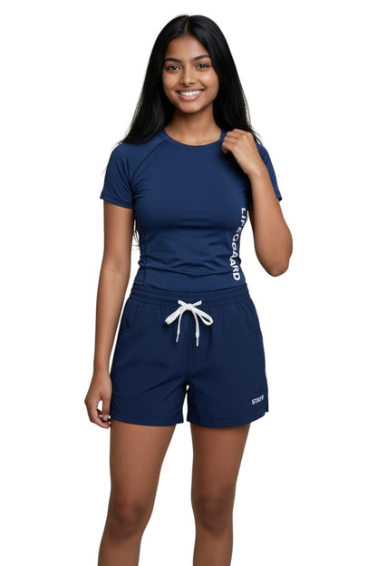 RISE Staff Female Roll Short in navy, shown on model