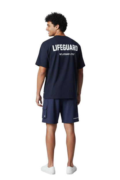 Kiefer Supervisor Board Short in navy, shown on model