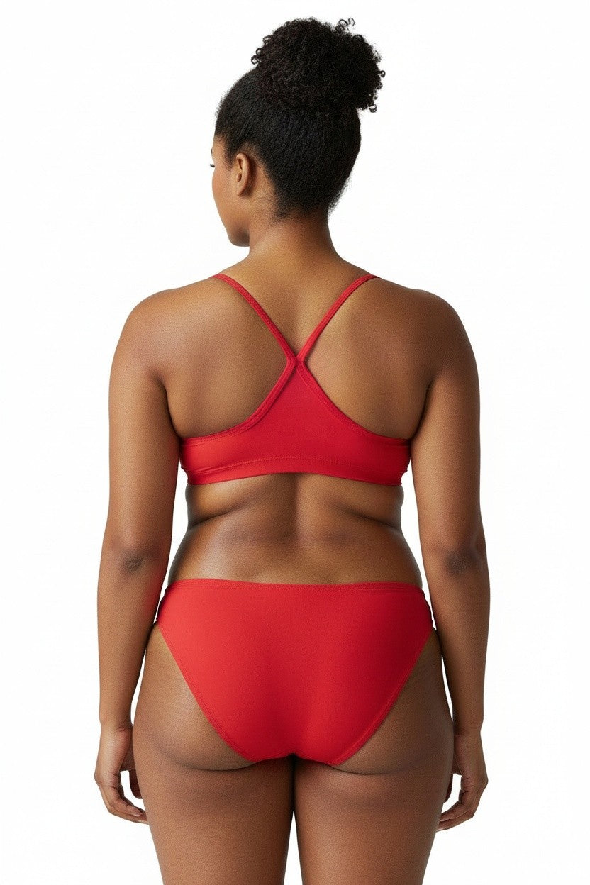 Back view of a woman wearing Kiefer red two-piece poly bikini with a cross-back strap design.