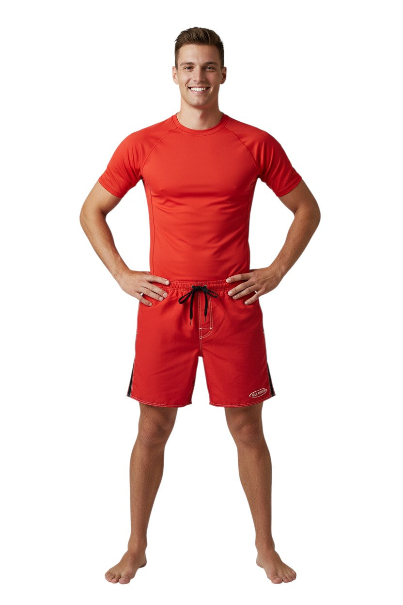 Red polyester board shorts with black side stripe and GUARD logo. Elastic waist, drawstring, and side pocket.