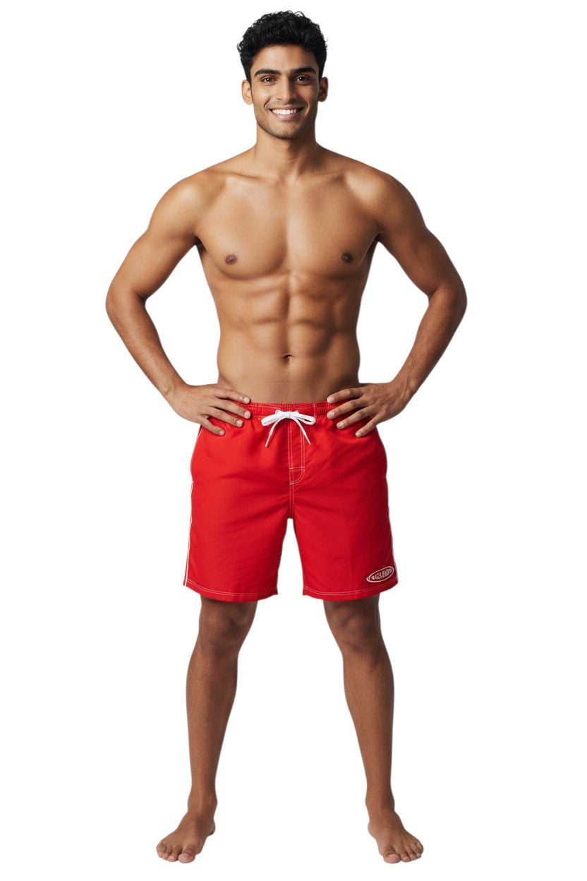 Red polyester blend boardshorts with white drawstring, contrast stitching, and GUARD logo. Elastic waistband and side pocket.