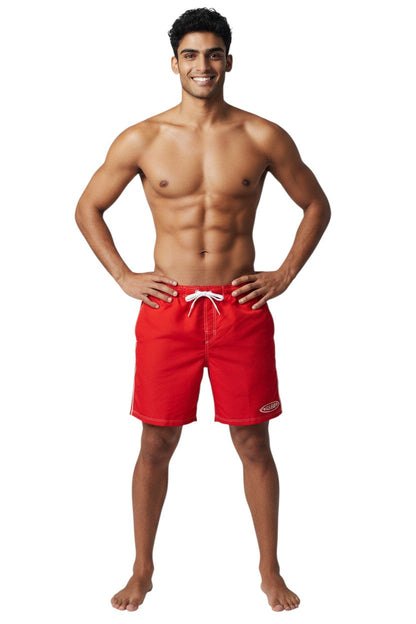 Red polyester blend boardshorts with white drawstring, contrast stitching, and GUARD logo. Elastic waistband and side pocket.