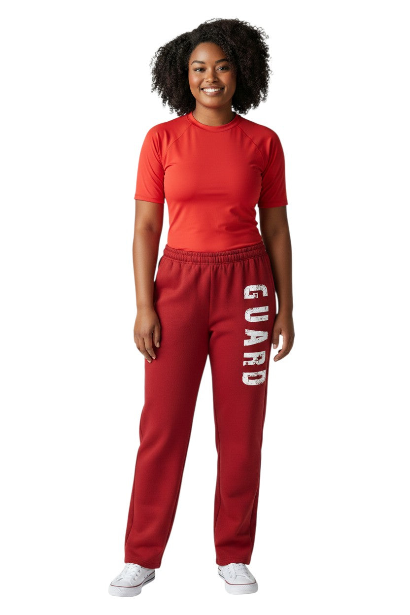 Kiefer red fleece sweatpants with white distressed "GUARD" logo down the left leg. Cotton/polyester blend.