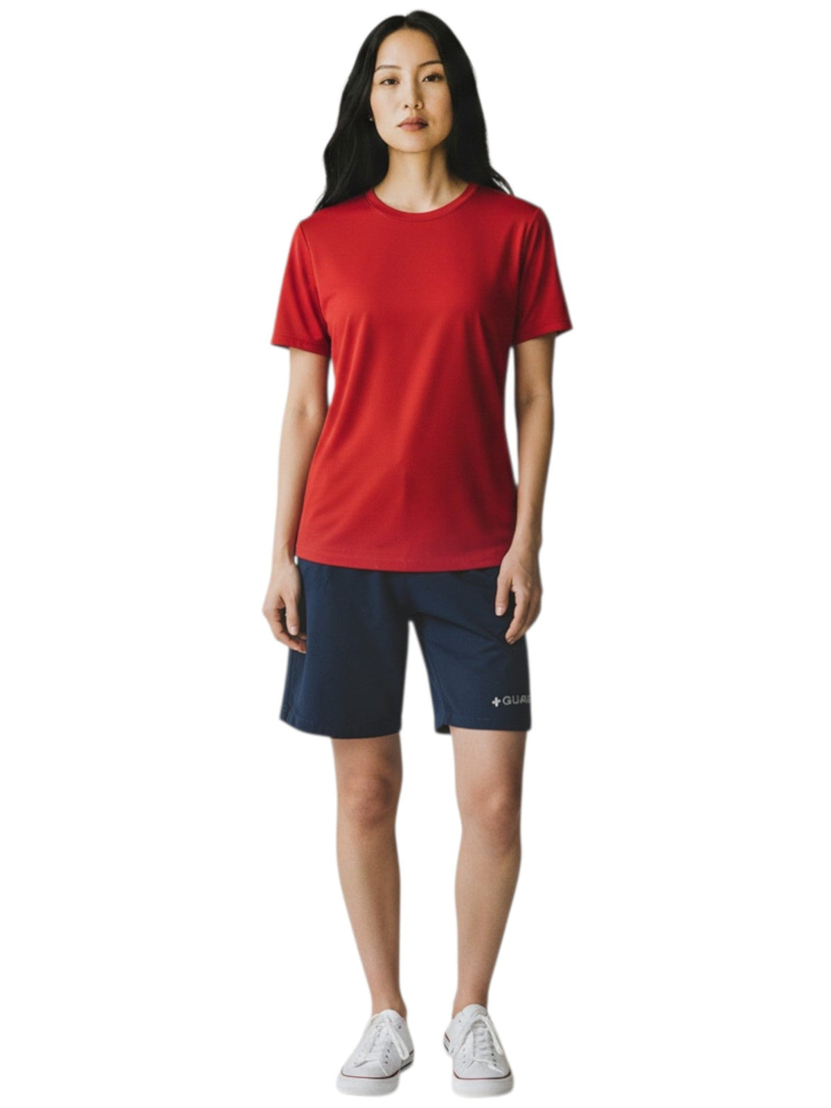 Kiefer RISE solid red short sleeve crew neck rashguard worn by a model with navy shorts