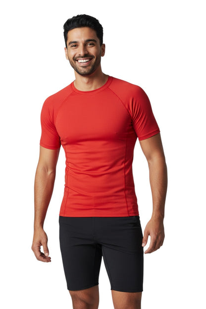 Kiefer Solid Short Sleeve Crewneck Rashguard in red, shown on model