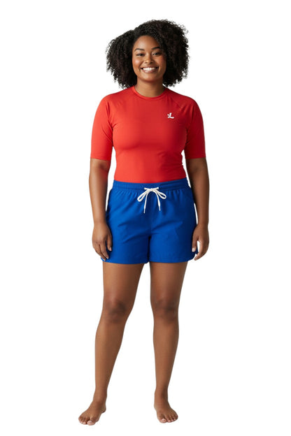 RISE Comfy Shorts in royal blue polyester with elastic waistband, drawstring, and two front pockets.