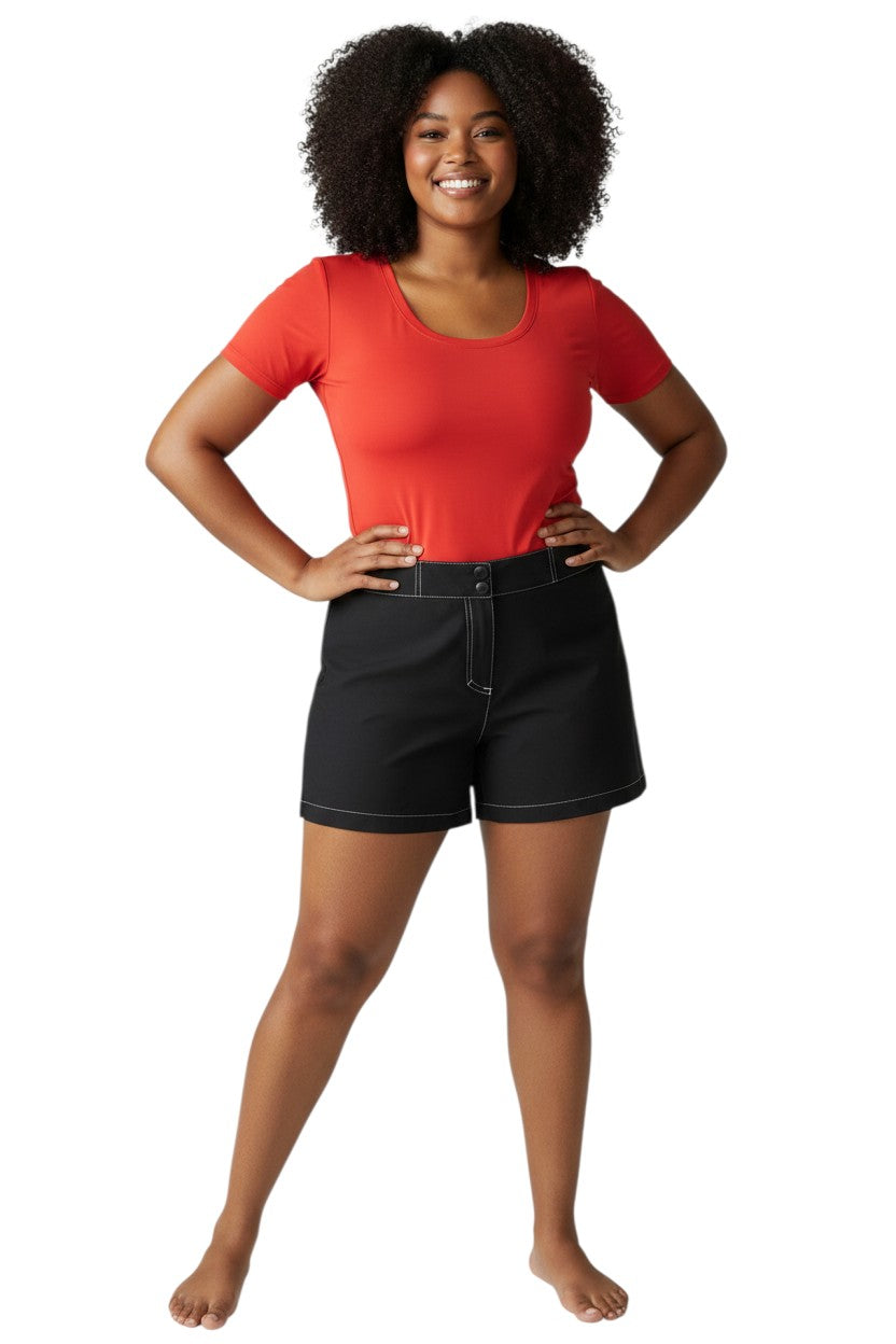 RISE Solid Female Flex Short in black polyester-spandex with 5" inseam and storage pocket.