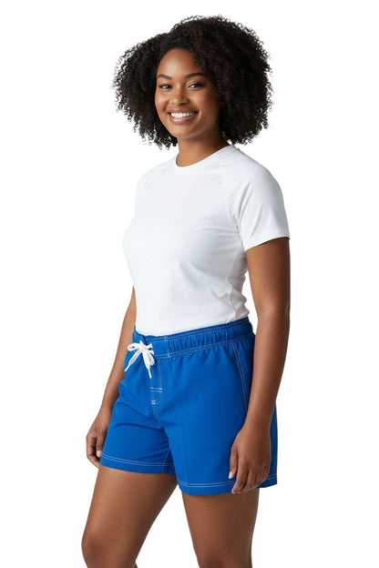 RISE Solid Female Flex Short in royal blue polyester with white contrast stitching, drawstring waist, and side pocket.